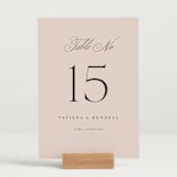 "Arch Monogram" - Table Numbers in Dusty Rose by Kelly Schmidt - Displayed (stand not included)
