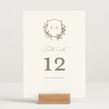 "Foliage Crest" - Table Numbers in Mulberry by Everett Paper Goods - Displayed (stand not included)