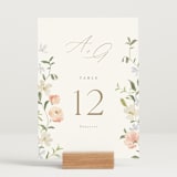 "Garden View" - Table Numbers in Peach by Everett Paper Goods - Displayed (stand not included)