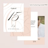 "Twirl Monogram A" - Table Numbers in Blush by Ariel Rutland - Back of Card Options