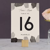 "love is strong" - Table Numbers in Onyx by Aspacia Kusulas - Front