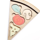 "Pizza Puzzle" - Toys in multicolorassorted-colors by Haven Print Co.