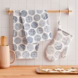 "Minimalist circles" - Tea Towel in Navy by Sabrin Deirani - In Home