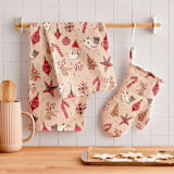 "Retro Ornaments" - Tea Towel in Coral by Vivian Yiwing - In Home