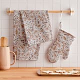 "Winter Berry" - Tea Towel in Brown by Nina Leth - In Home