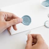 "Protea in Blue | Papel and Co. x Artisaire (pack of 25)" - Wax Seals, Pack of 25 in Dusty Blue by Minted - Adhesive Backer