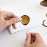 "Merry Christmas in Gold (pack of 25)" - Wax Seals, Pack of 25 in Antique Gold by Minted - Adhesive Backer