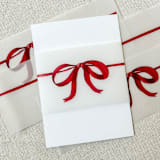 "Tie It With A Bow Vellum Belly Bands | Set of 25" - Belly Bands in red by Megan Tendler