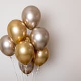 "Heavy Metal Balloon Bouquet" - Balloons in gold by Balloon and Bash