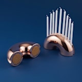 "Nosh Menorah - Rose Gold" - Candle Holders in copper by Leadoff Studio