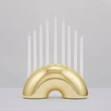 "Nosh Menorah - Brass" - Candle Holders in brass by Leadoff Studio