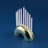 "Nosh Menorah - Brass" - Candle Holders in brass by Leadoff Studio