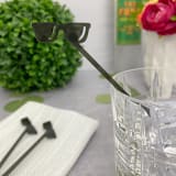 "Sunglasses Stir Sticks - Transparent Black (Set of 25)" - Stir Sticks in white by Atomic Kraftworks