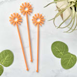 "Mid Mod Sun Stir Sticks - Coral (Set of 25)" - Stir Sticks in brown by Atomic Kraftworks