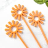 "Mid Mod Sun Stir Sticks - Coral (Set of 25)" - Stir Sticks in brown by Atomic Kraftworks
