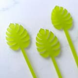 "Monstera Stir Sticks - Frosted Kiwi (Set of 25)" - Stir Sticks in white by Atomic Kraftworks