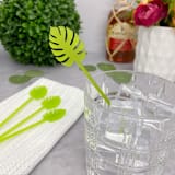 "Monstera Stir Sticks - Frosted Kiwi (Set of 25)" - Stir Sticks in white by Atomic Kraftworks