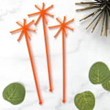 "Starburst Stir Sticks - Orange (Set of 25)" - Stir Sticks in pink by Atomic Kraftworks