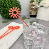 "Mid Mod Sun Stir Sticks - Frosted Poppy (Set of 25)" - Stir Sticks in pink by Atomic Kraftworks