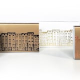 "Cozy Village Matchbox, Gold on White" - Matchbooks and Matches in gold by Jessica Cunningham