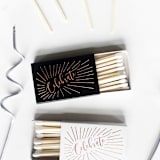 "Celebrate Matchbox, Gold on White" - Matchbooks and Matches in white by Jessica Cunningham