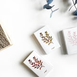 "Sage Matchbox, Gold on White" - Matchbooks and Matches in white by Jessica Cunningham
