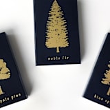 "Noble Fir Tree Matchbox, Gold on Black" - Matchbooks and Matches in gold by Jessica Cunningham