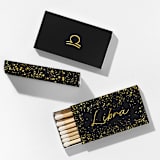 "Libra Matchboxes, Black and Gold, Pack of 4" - Matchbooks and Matches in natural by ForYourParty