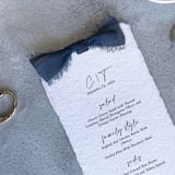 "Handmade Paper Menus With Navy Blue Bow | Set Of 10 | Custom Text" - Menus in blue by Cotton and Bow