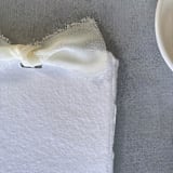 "Handmade Paper Menus With Ivory Bow | Set Of 10 | Custom Text" - Menus in white by Cotton and Bow