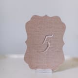 "Mushroom Script Scroll Table Number" - Table Numbers in beige by Velvet Raptor