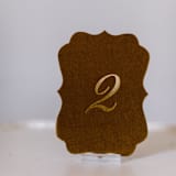 "Gold Script Scroll Table Number" - Table Numbers in gold by Velvet Raptor