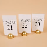 "Table Number | Set “21-30” | White & Gold" - Table Numbers in white by Hanna Roberts