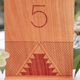 "Xubáa Indigenous Design Hardwood" - Table Numbers in natural by poem wedding team