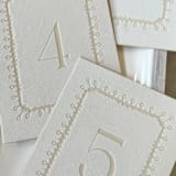 "Etched White Velvet Table Numbers" - Table Numbers in white by Christopher Neubauer