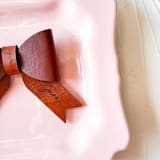 "Custom Leather Bow Place Setting, Set of 2" - Place and Escort Cards in brown by Left Grain