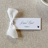 "Slim Place Cards With White Bow | Set Of 10 | Custom Text" - Place and Escort Cards in white by Cotton and Bow