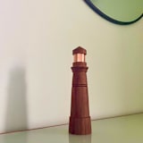 "Modern Lighthouse Limited Edition" - Christmas Decorations in brown by Ann Nygard