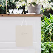 "Scripted Names" - Small Signs in Ecru by Hooray Creative - In Use