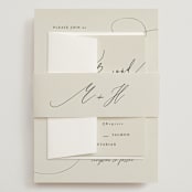 "Tilted Script" - Wedding Invitations in Ivory by Hannah Williams - Assembled with Belly Band