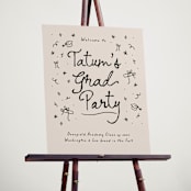 "Illustrated Grad" - Graduation Welcome Signs in Onyx by Ashley Iwafuchi - In Use