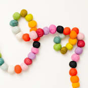 "Spectrum Felt Ball Garland" - Garlands in multicolor by aubry bennion