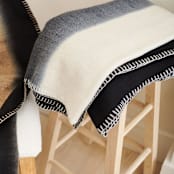 "Ink Black White Ombre Textured Throw In Hand Spun Merino And Hand Stitched Hem" - Blankets and Throws in black by Anjali Purohit