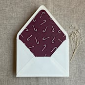 "Merlot holiday candy cane printed envelope liner for A7 euro flap envelope  | pack of 10" - Envelope Liners in purple by Ivory Invitations