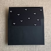 "Black baby ribbon bows envelope liner for A7 square envelope | pack of 10" - Envelope Liners in black by Ivory Invitations