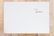 "Sucks" - Cards in Red by Three Wings North - Interior
