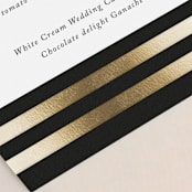 "Deluxe" - Foil-Pressed Menus in Tuxedo by Jennifer Postorino - Detail