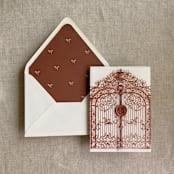 "Rust vintage arched gate printed vellum wrap for 5x7 card | pack of 10" - Invitation Jackets and Overlays in copper by Ivory Invitations
