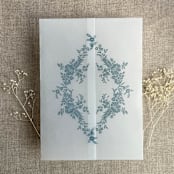 "Steel blue print French floral crest vellum wrap for 5x7 card | pack of 10" - Invitation Jackets and Overlays in blue by Ivory Invitations