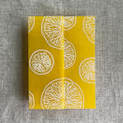 "White ink printed citrus celebration yellow vellum wraps for 5x7 card | pack of 10" - Invitation Jackets and Overlays in yellow by Ivory Invitations